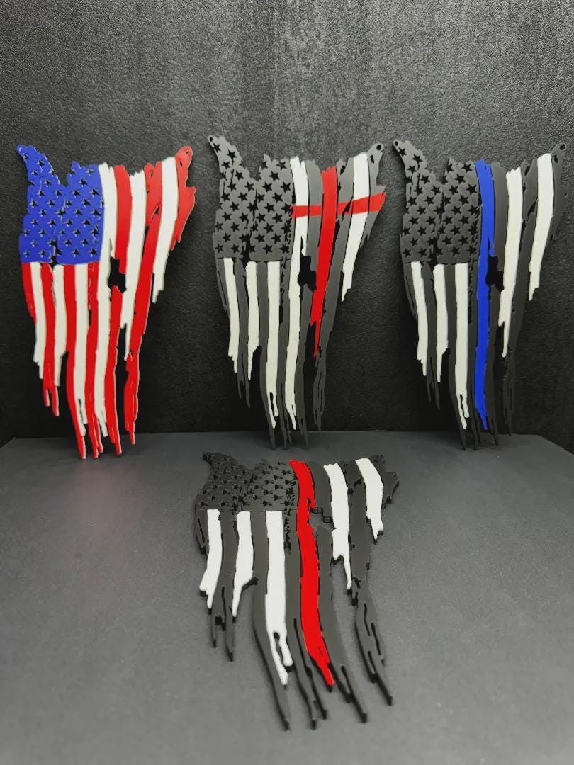 Tattered American flag wall decor in four styles: full color, red line, blue line and a smaller red line, on gray display