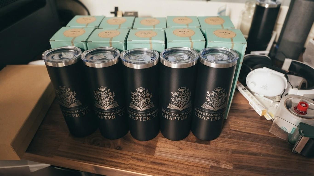 Real bulk order of black laser engraved logo tumblers ready to ship, employee and client gifts